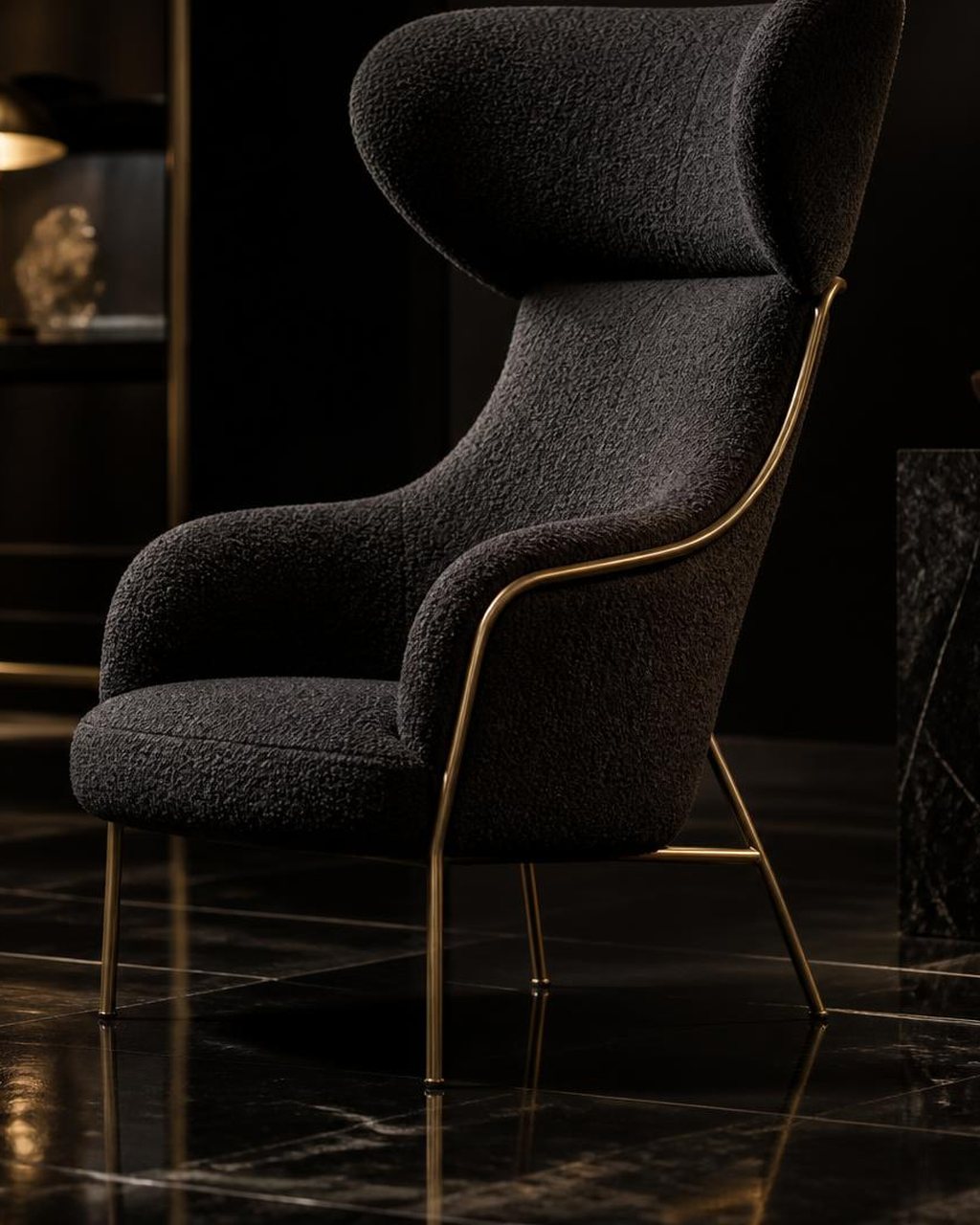 Sculptural boucle lounge chair with a brass frame in the Nexora showroom